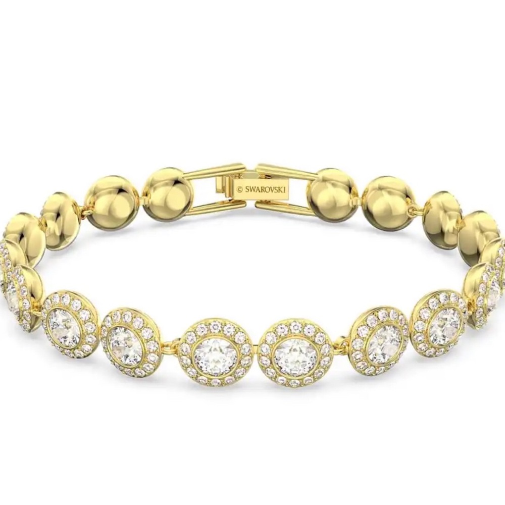 Authentic signed Swarovski Crystals Rose gold Angelic bracelet and ring 55 set.